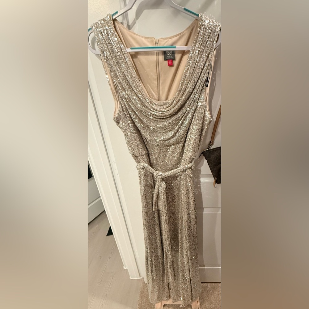 Vince Camuto Silver
Sequin Cowl Neck Sleeveless Tie
Waist Wide Leg Jumpsuit